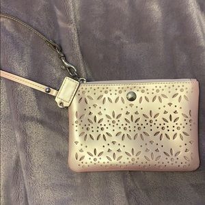 Iridescent/light pink Coach wristlet